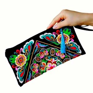Embroidered zippered clutch black with ginseng flowers